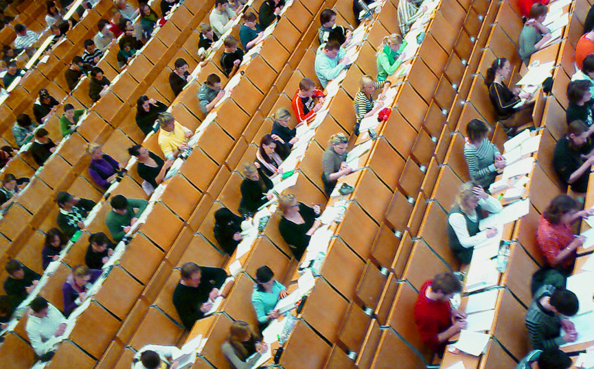 students taking a test in a classroom