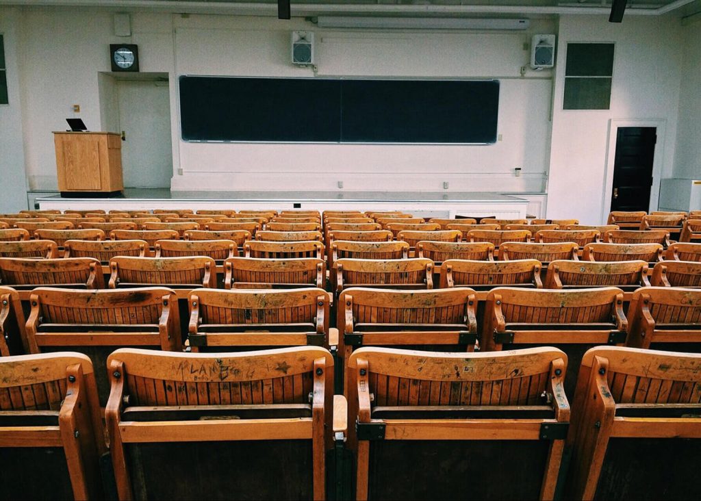 Lecture hall with empty seating.