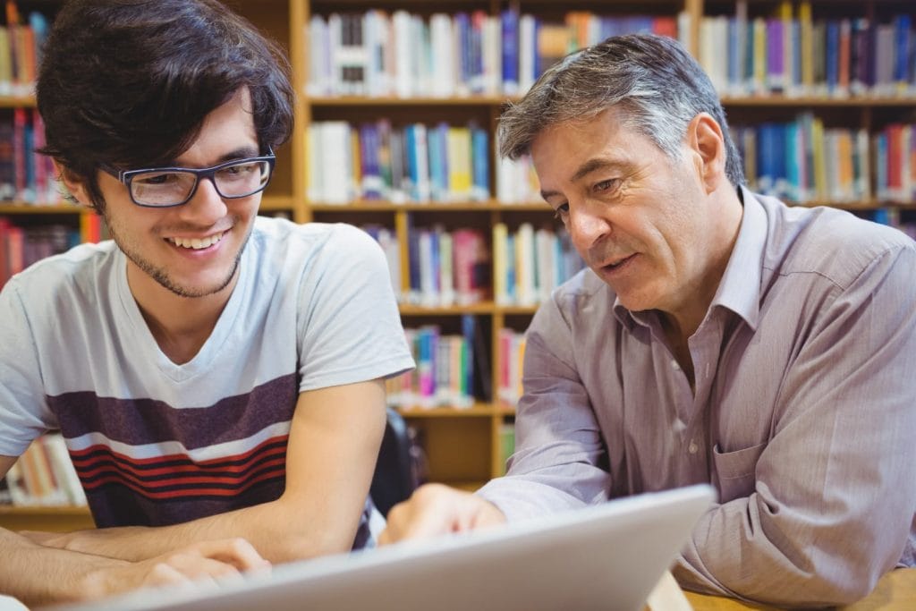 Instructor giving feedback to a student