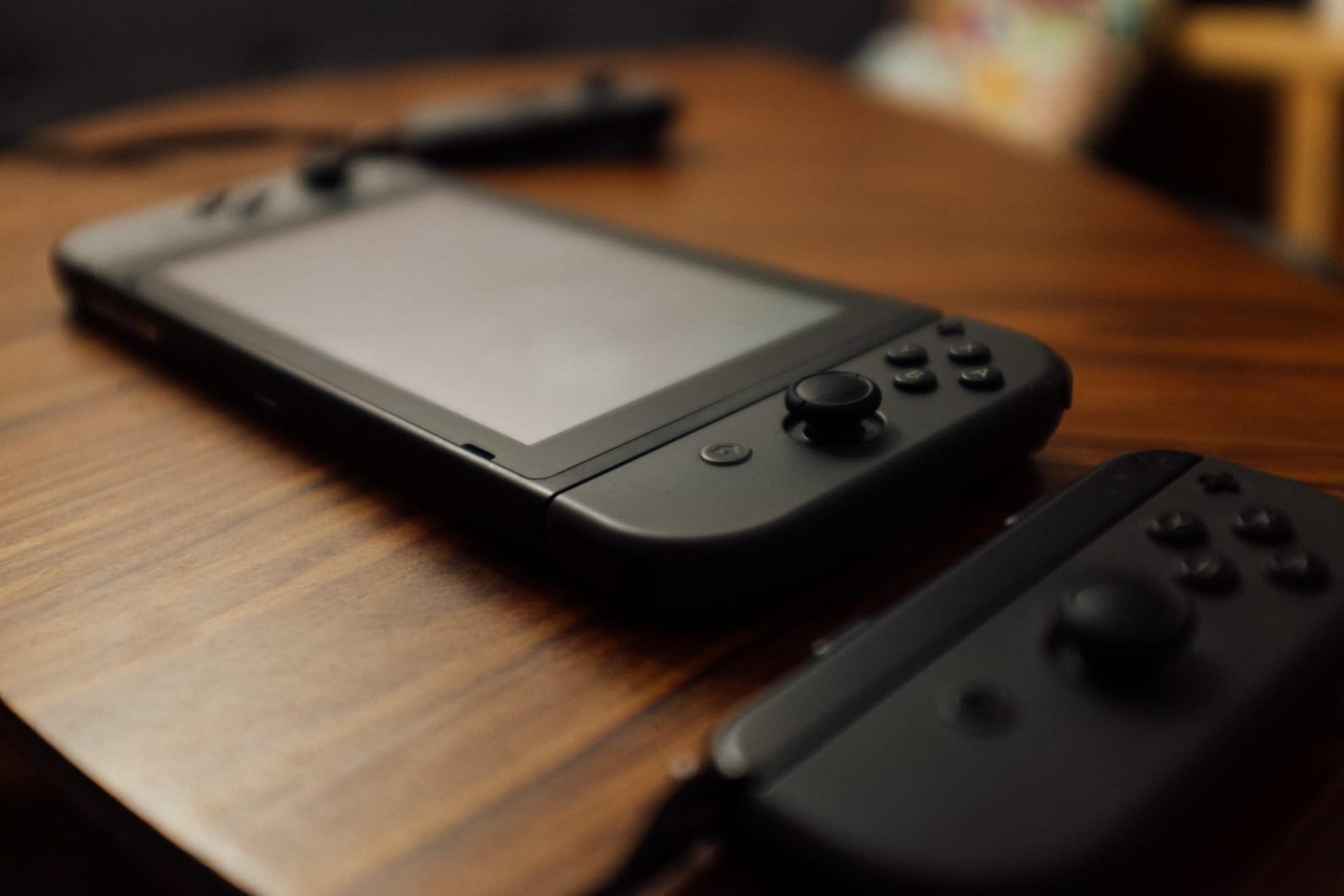 handheld switch console sitting on desk